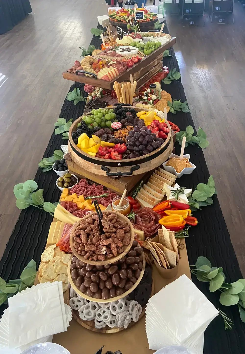 Long banquet style table with charcuterie displays